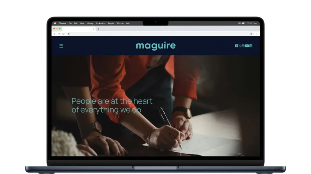 The Maguire website on a laptop, a custom WordPress build showing what a website costs in Dubai at streetlevel.ae