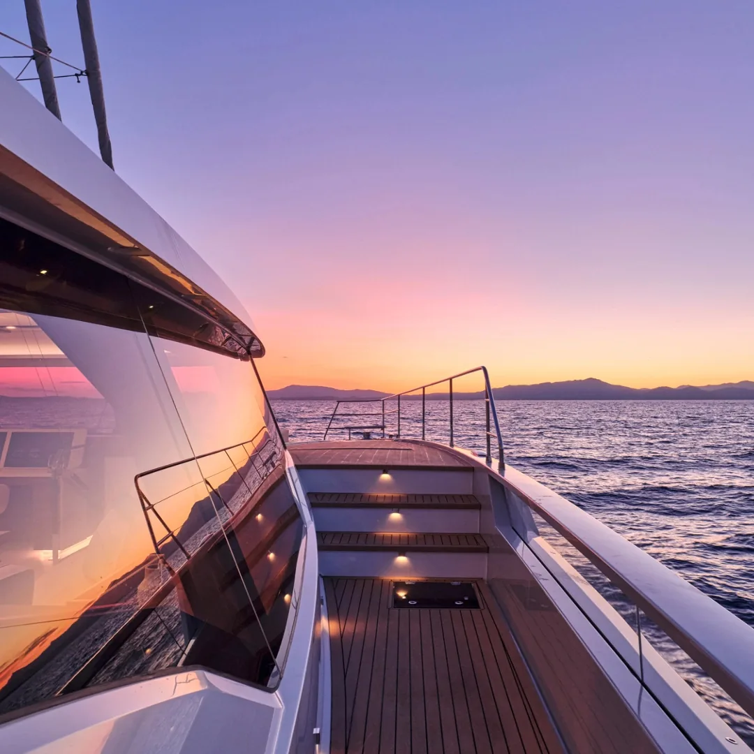 Odyssea Yachting yacht side deck at sunset