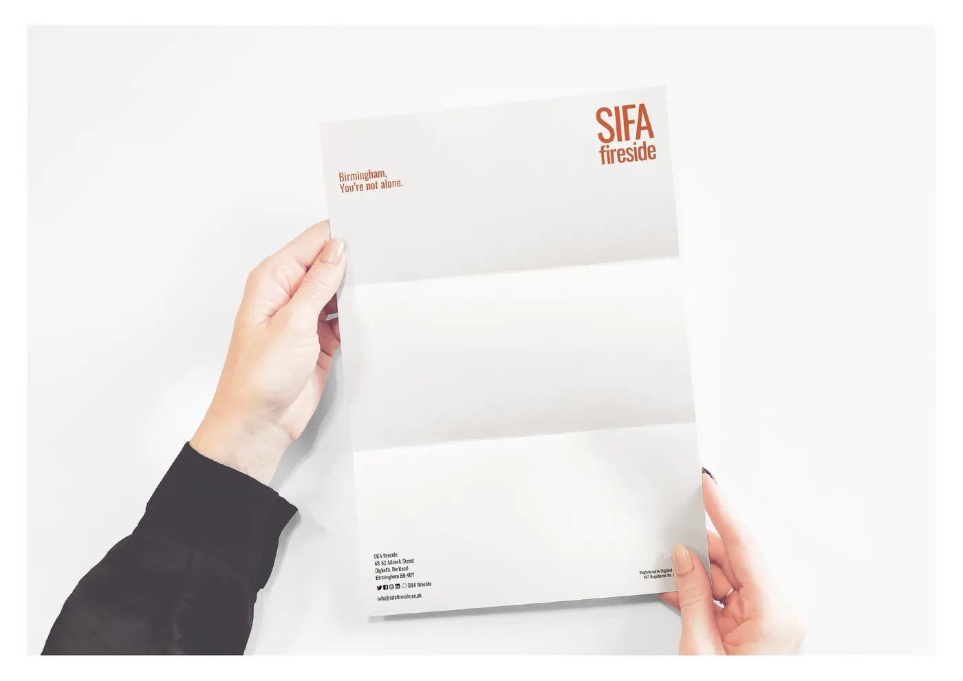 SIFA Fireside letterhead and business card