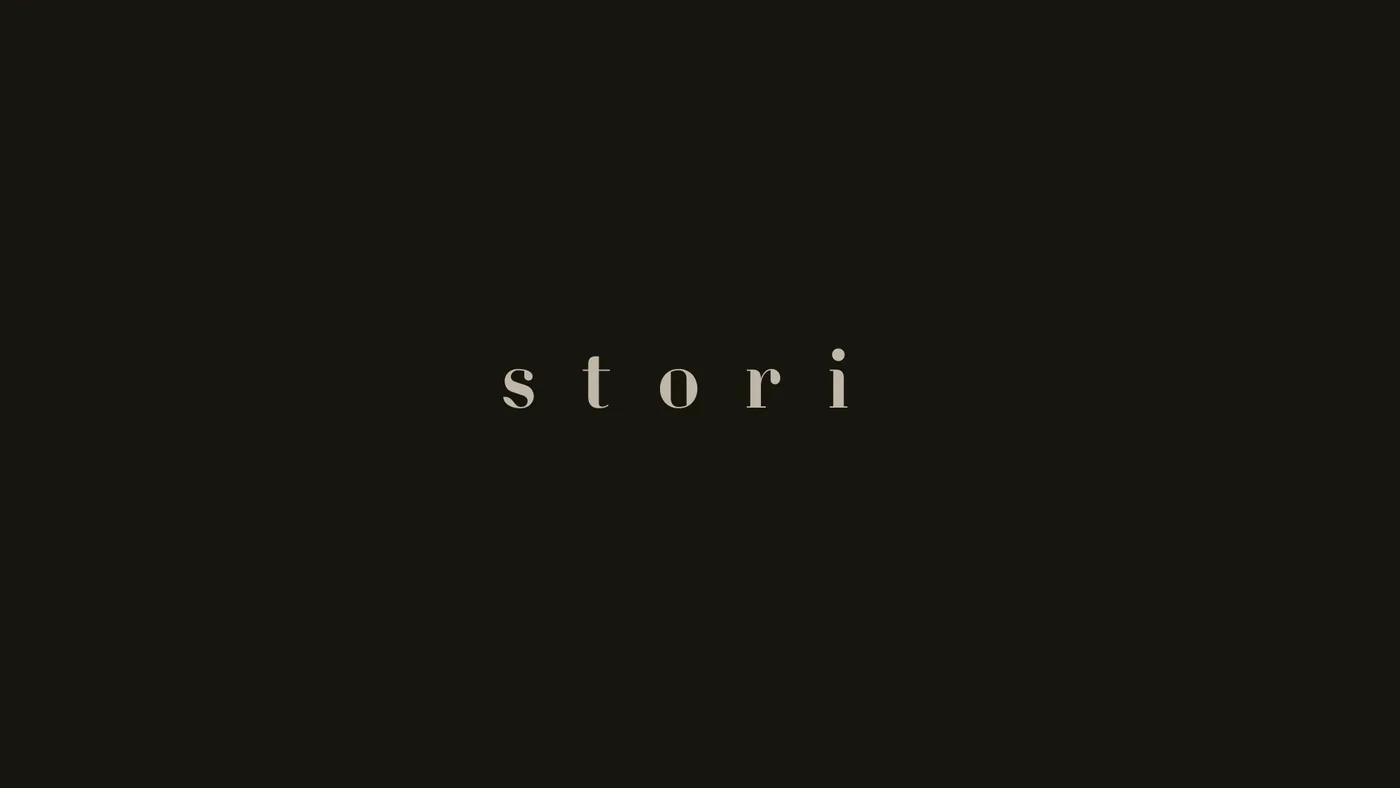 Stori logotype, bronze on black