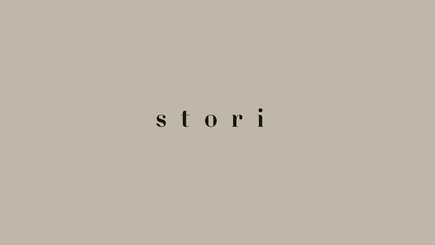 Stori logotype, black on bronze
